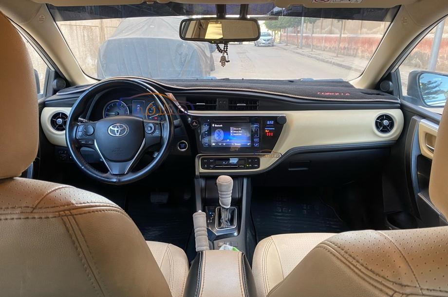 Corolla Toyota 2018 Helwan White 5954640 - Car for sale : Hatla2ee