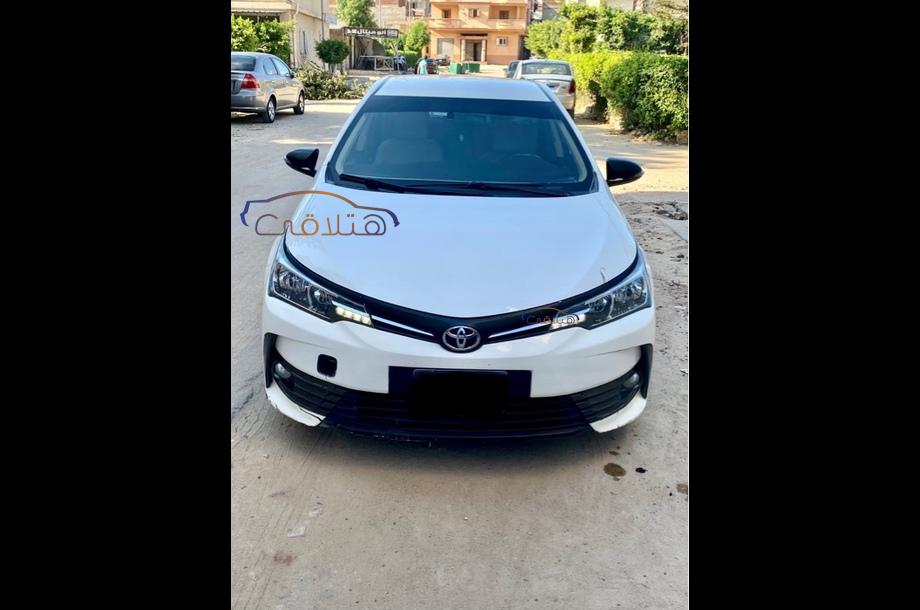 Corolla Toyota 2018 Helwan White 5954640 - Car for sale : Hatla2ee