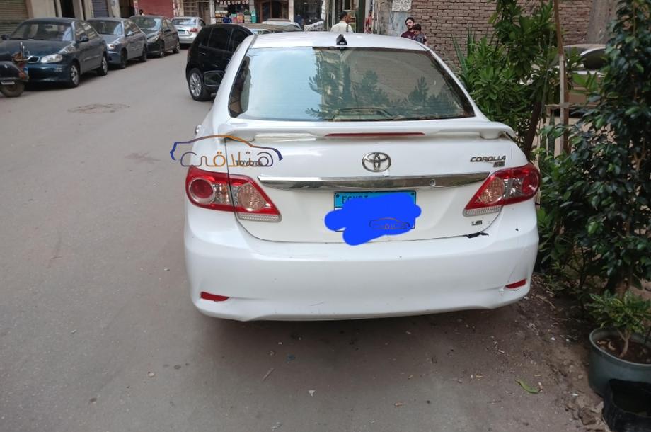 Corolla Toyota 2013 Zagazig White 6037485 - Car for sale : Hatla2ee