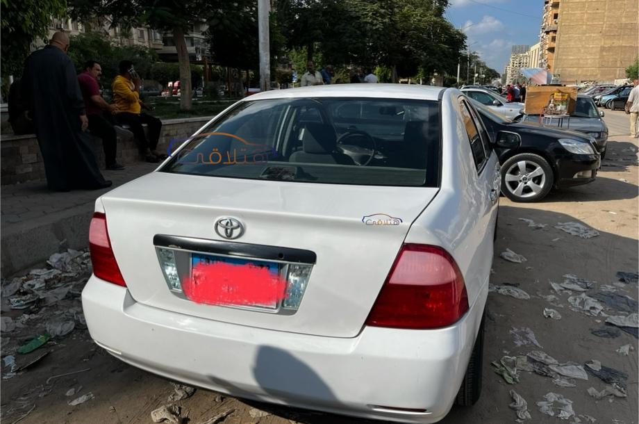 Corolla Toyota 2004 Mansoura White 6059326 - Car for sale : Hatla2ee