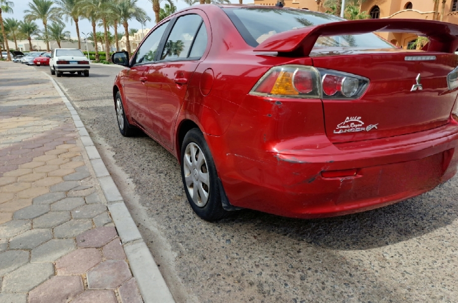 Lancer Mitsubishi 2015 Red Sea Red 6128721 Car for sale Hatla2ee