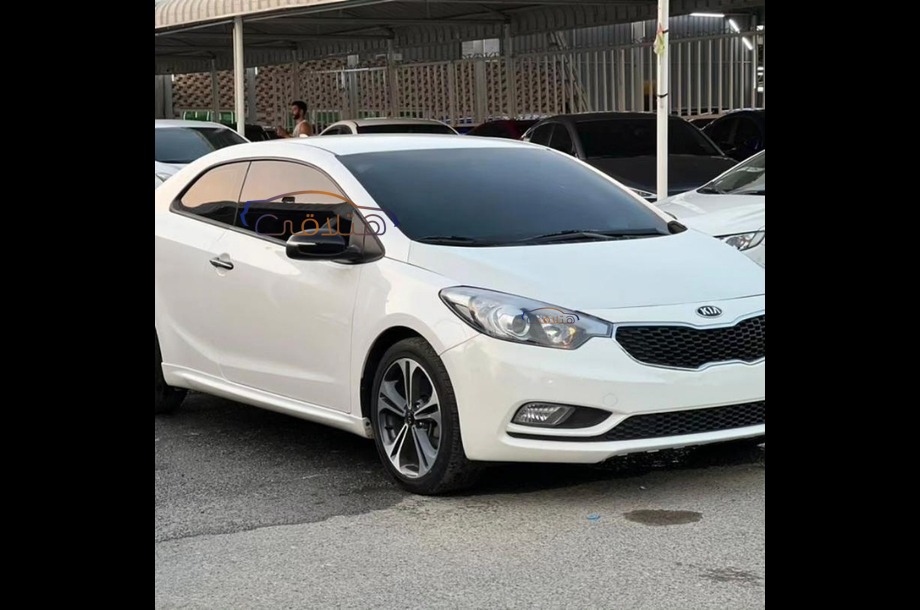 Cerato Koup Kia 2014 Cairo White 6270561 - Car for sale : Hatla2ee