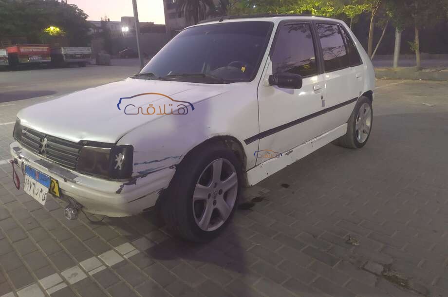 205 Peugeot 1985 10th of Ramadan White 6547107 - Car for sale : Hatla2ee