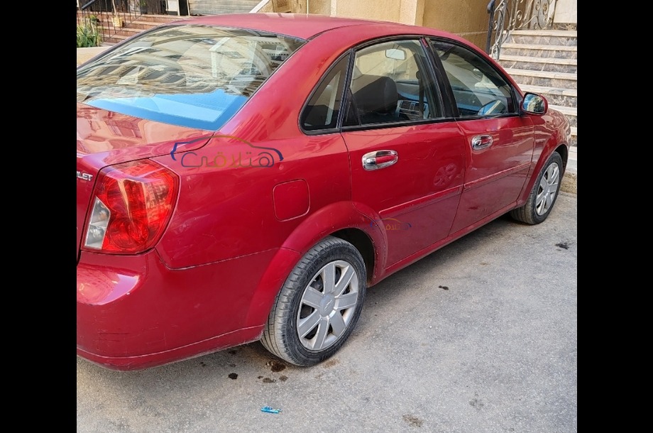Optra Chevrolet 2012 Mokattam Red 6616946 - Car for sale : Hatla2ee