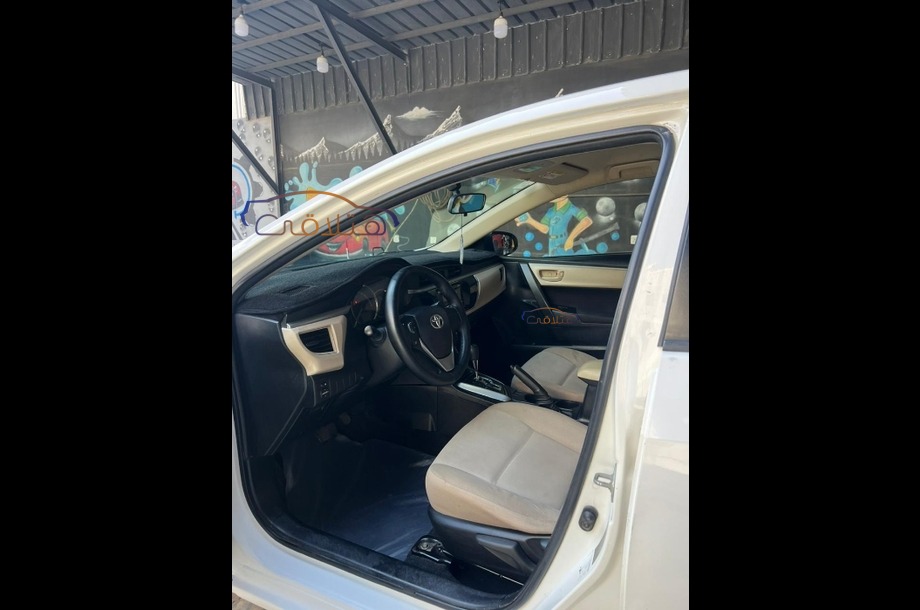 Corolla Toyota 2015 Medina White 6644384 Car for sale Hatla2ee