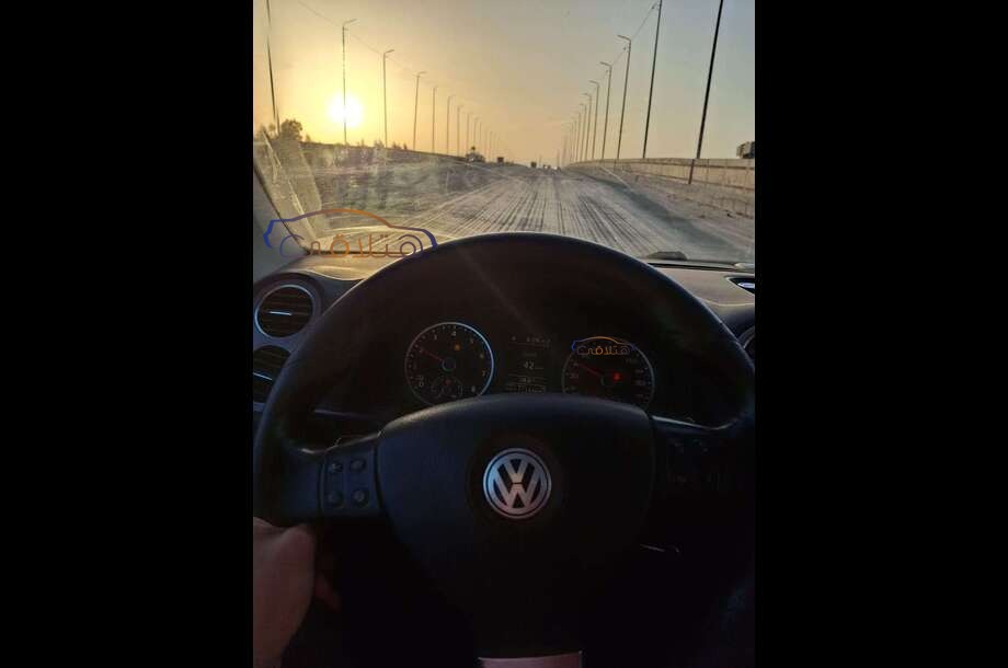 Tiguan Volkswagen 2010 Abu Qir Black 6705415 Car for sale Hatla2ee