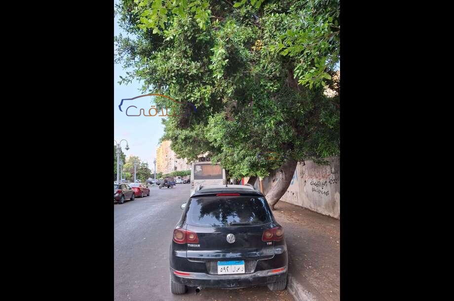 Tiguan Volkswagen 2010 Abu Qir Black 6705415 Car for sale Hatla2ee