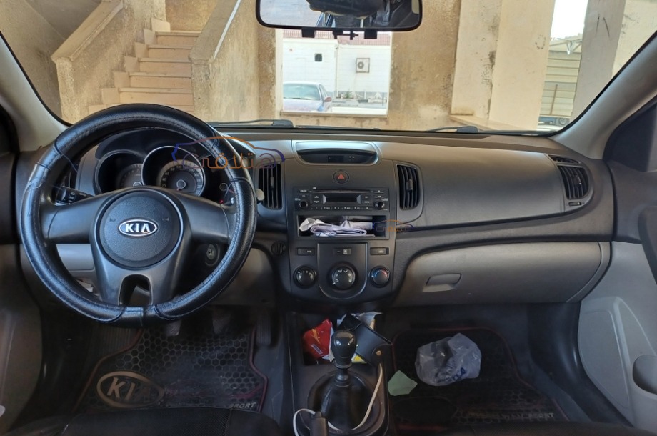 Cerato Kia 2010 Ismailia Eggplant 6708124 Car for sale Hatla2ee