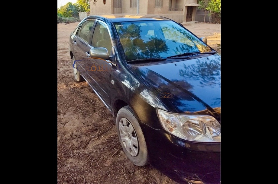 Corolla Toyota 2006 Shibin el Kom Black 6710021 Car for sale Hatla2ee