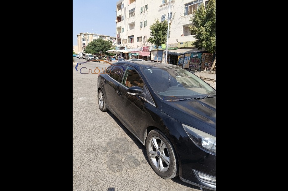 Focus Ford 2016 Sheikh Zayed City Black 6712223 Car for sale Hatla2ee