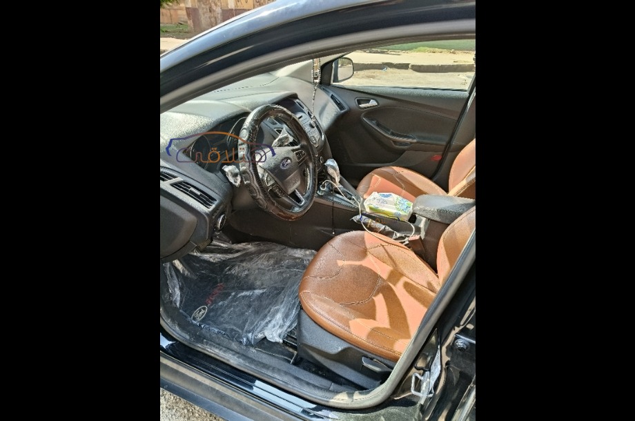 Focus Ford 2016 Sheikh Zayed City Black 6712223 Car for sale Hatla2ee