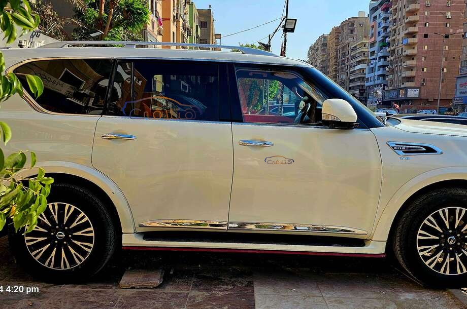 Patrol Nissan 2015 Nasr city White 6716470 Car for sale Hatla2ee