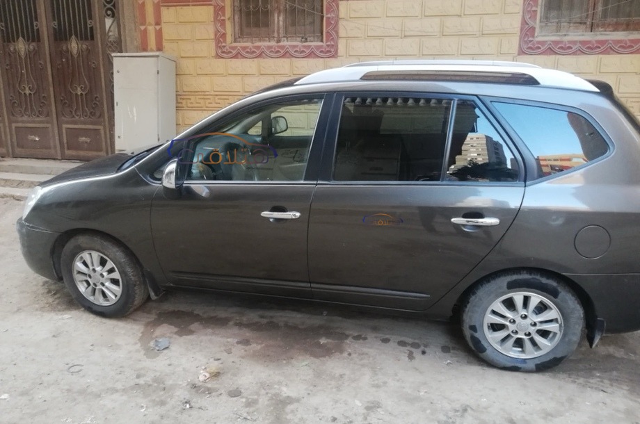 carens-kia-2012-giza-red-6736835-car-for-sale-hatla2ee