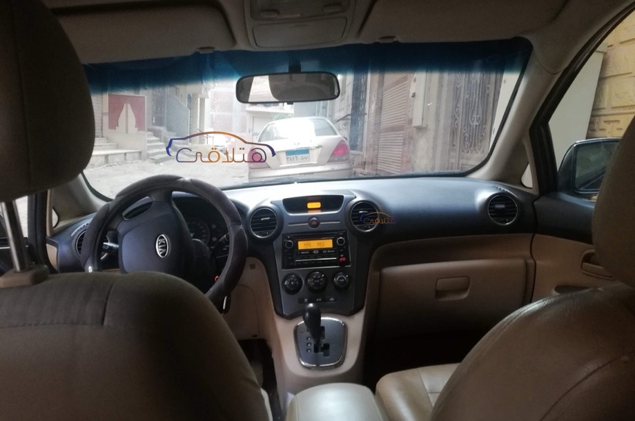 carens-kia-2012-giza-red-6736835-car-for-sale-hatla2ee