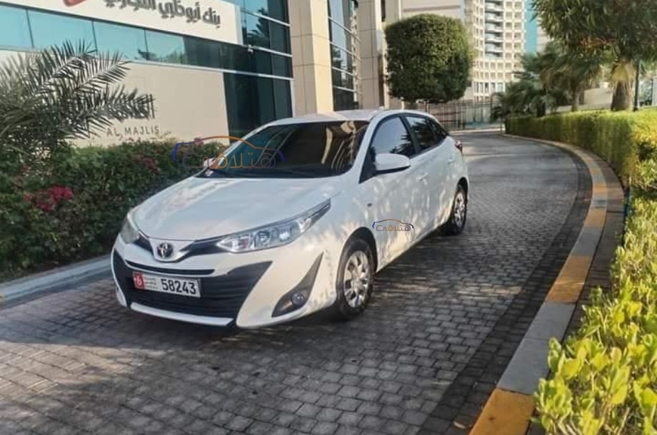 Yaris Toyota 2019 Dubai White 6744133 Car for sale Hatla2ee