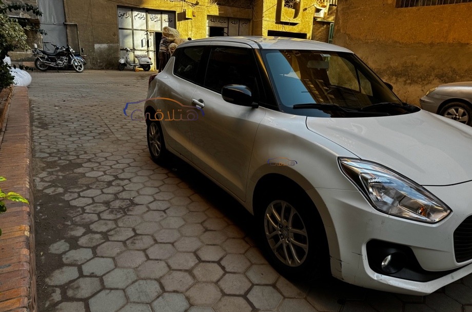 Swift Suzuki 2021 El Mahalla White 6772397 Car for sale Hatla2ee