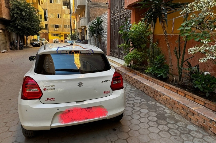 Swift Suzuki 2021 El Mahalla White 6772397 Car for sale Hatla2ee