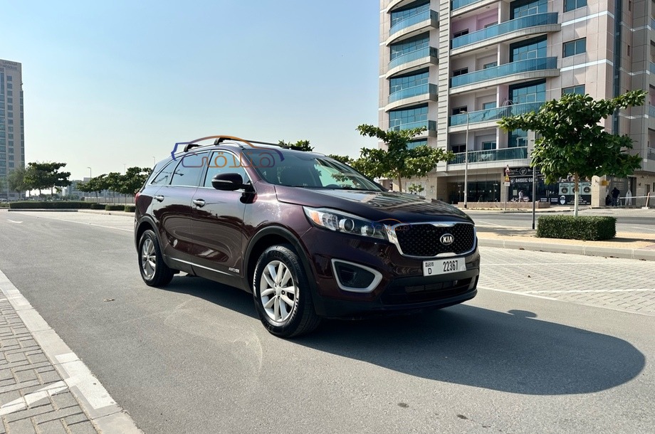 Sorento Kia Dubai Dark red 6796132 Car for sale Hatla2ee