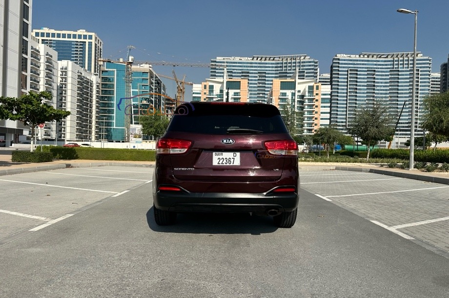 Sorento Kia Dubai Dark red 6796132 Car for sale Hatla2ee