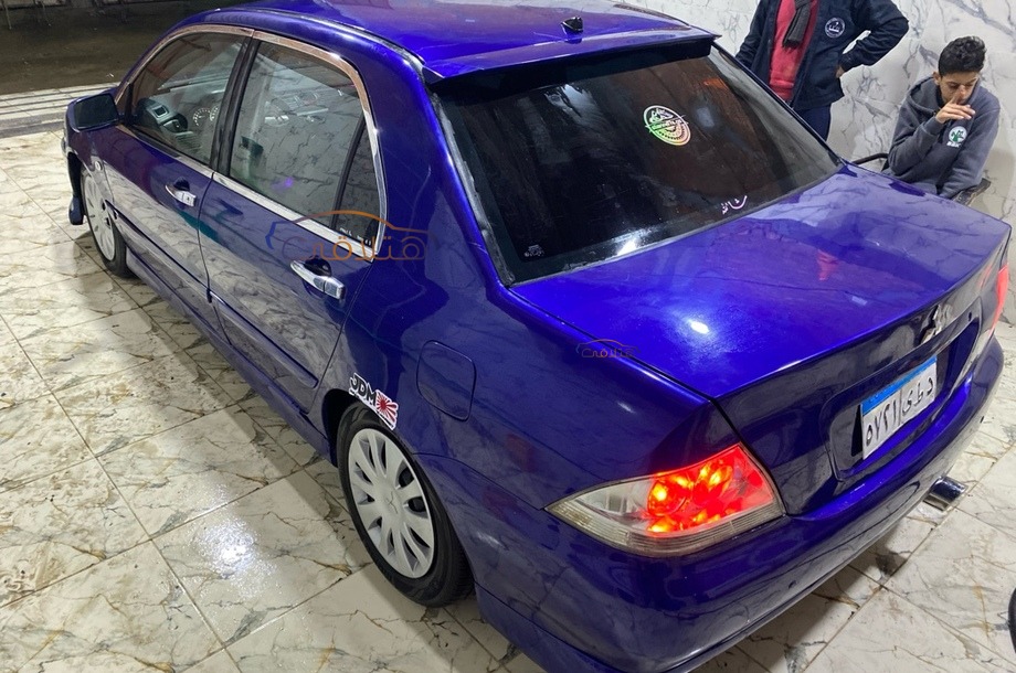 Lancer Puma Mitsubishi 2007 Dakahlia Blue 6883031 - Car for sale : Hatla2ee