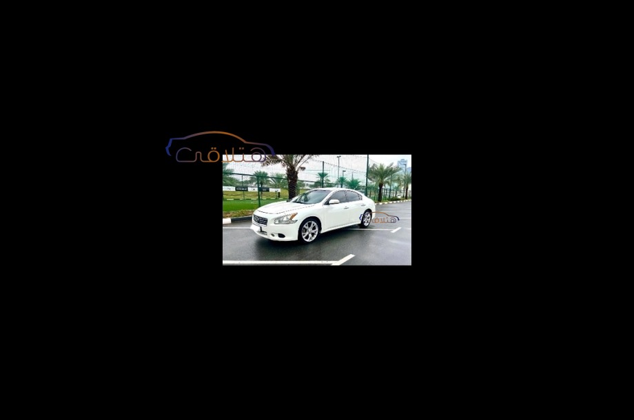 Maxima Nissan White