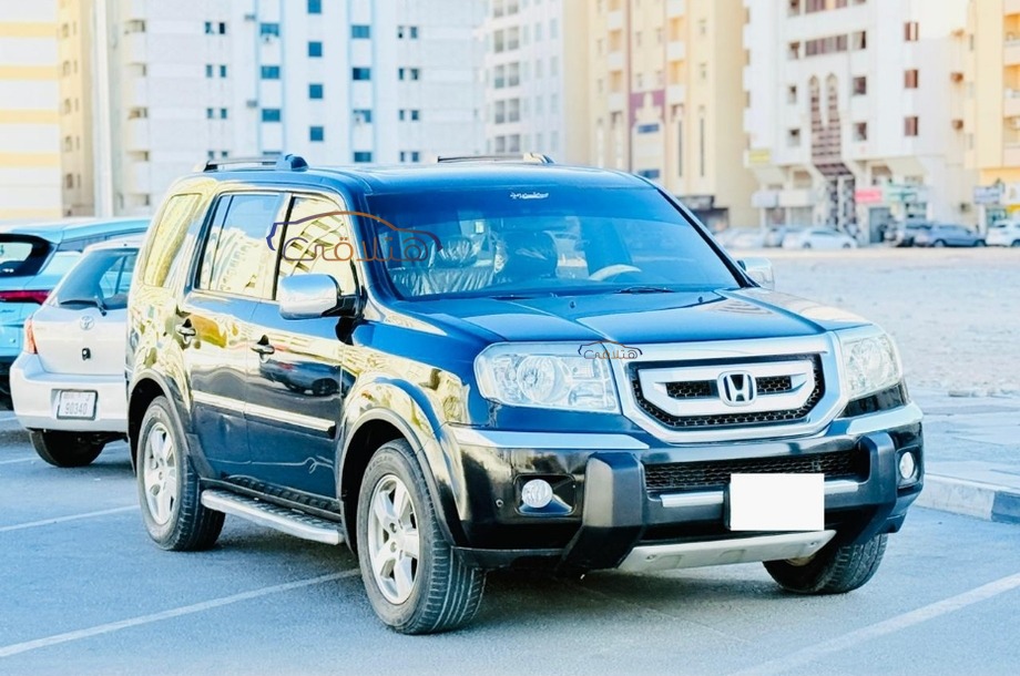 Pilot Honda أسود