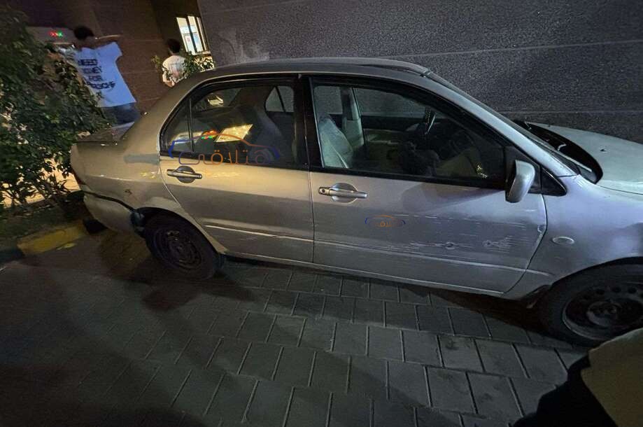 Lancer Puma Mitsubishi فضي