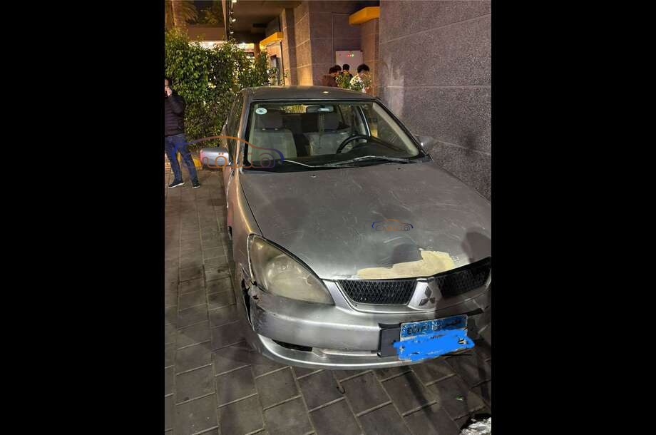 Lancer Puma Mitsubishi فضي