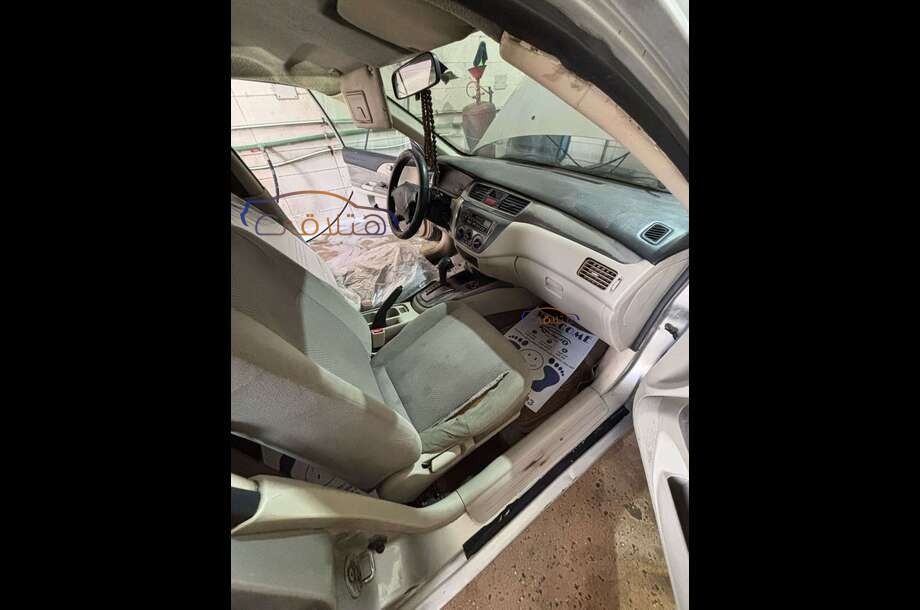 Lancer Puma Mitsubishi فضي