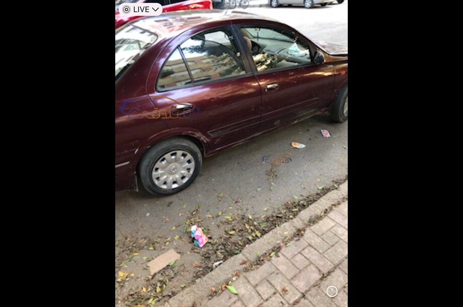 Sunny Nissan Dark red