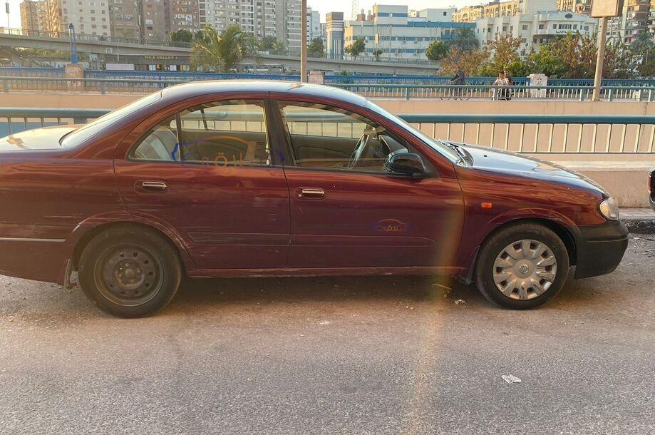 Sunny Nissan Dark red