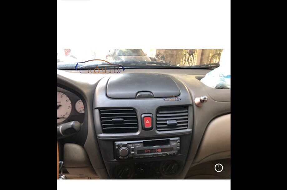 Sunny Nissan Dark red