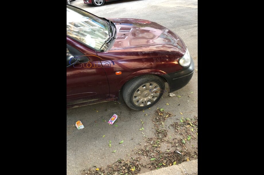 Sunny Nissan Dark red