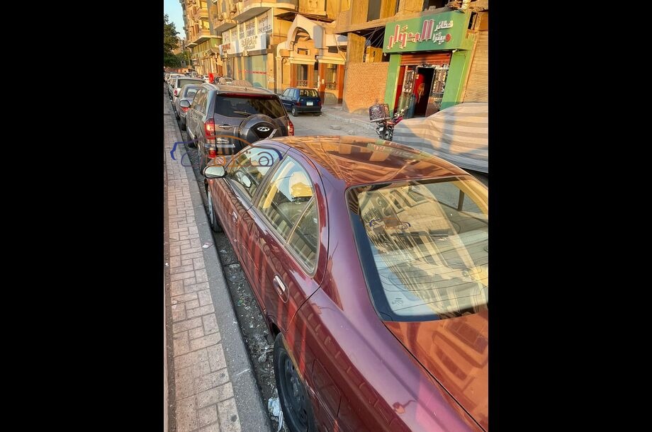 Sunny Nissan Dark red