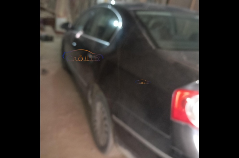 Passat Volkswagen أسود