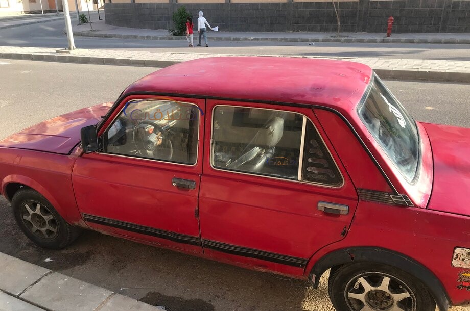 128 Fiat احمر