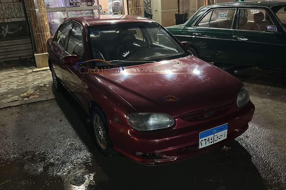 Sephia Kia احمر غامق