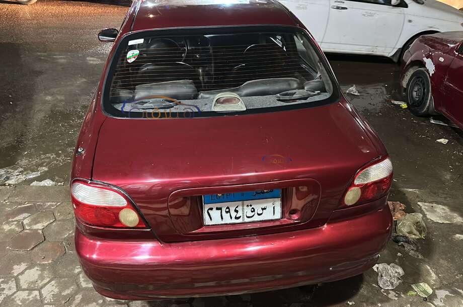 Sephia Kia احمر غامق