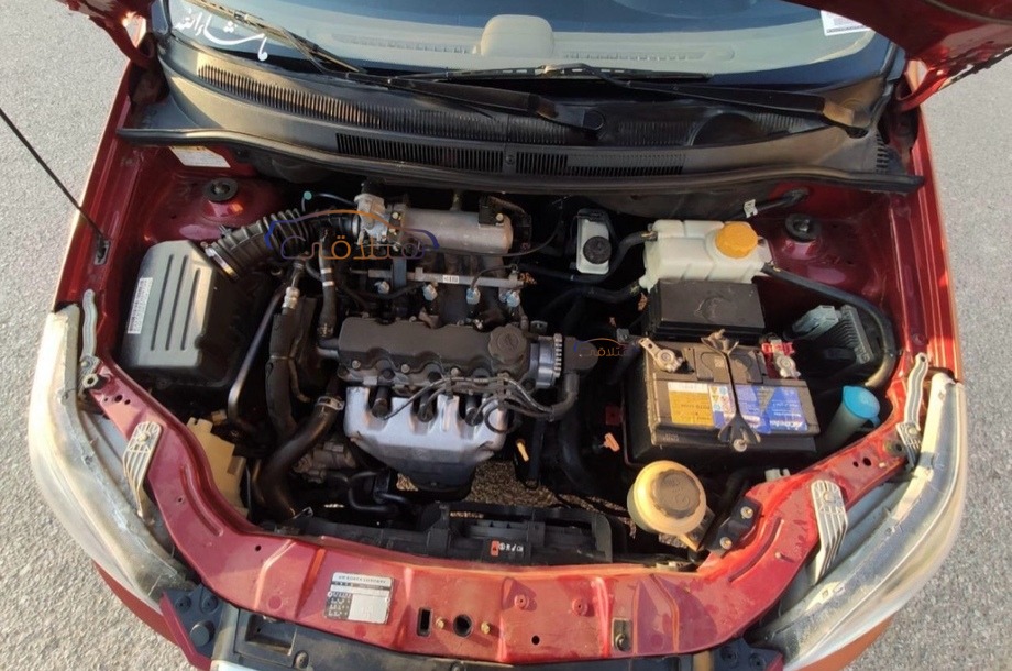 Aveo Chevrolet احمر غامق