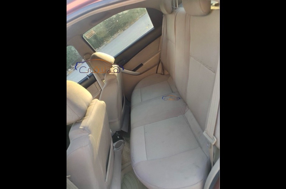 Aveo Chevrolet احمر غامق