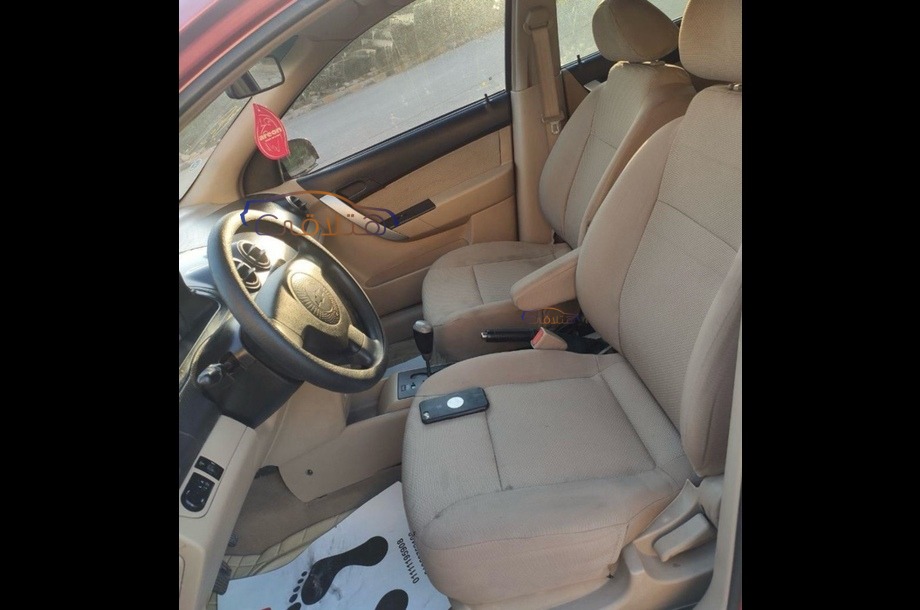 Aveo Chevrolet احمر غامق