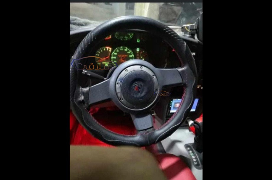 Wira Proton زيتوني