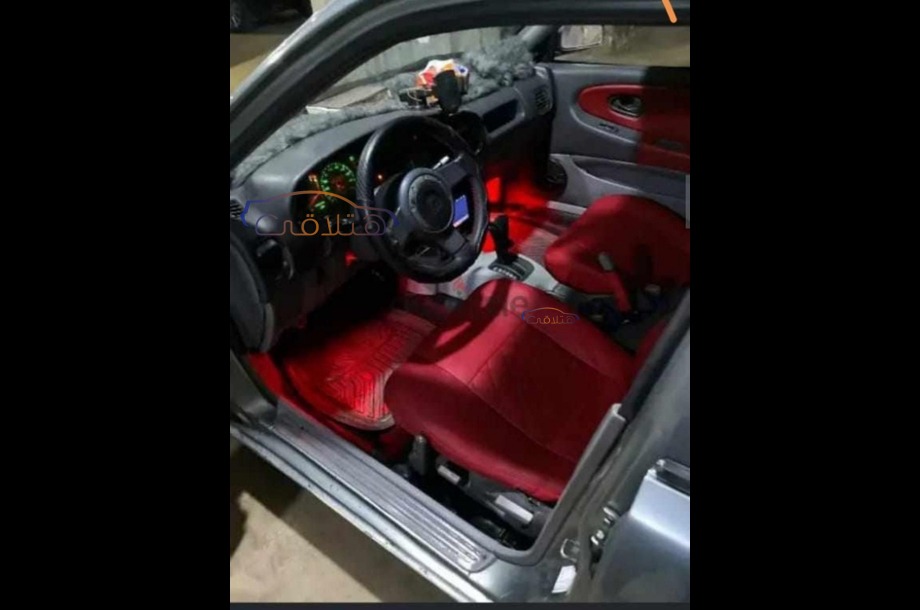 Wira Proton زيتوني