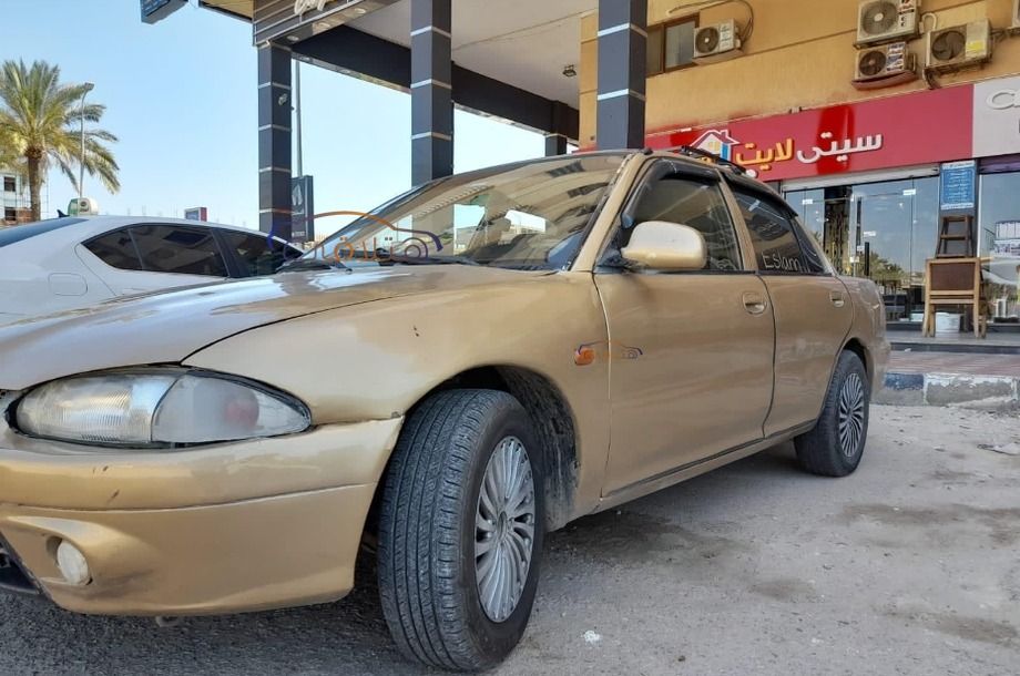 Wira Proton ذهبي