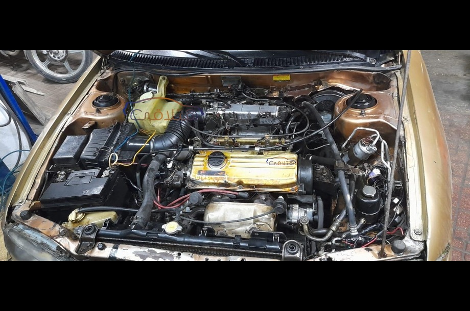 Wira Proton ذهبي