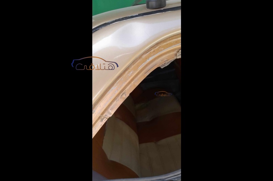 Wira Proton ذهبي