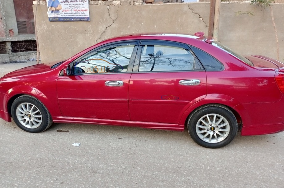 Optra Chevrolet Dark red