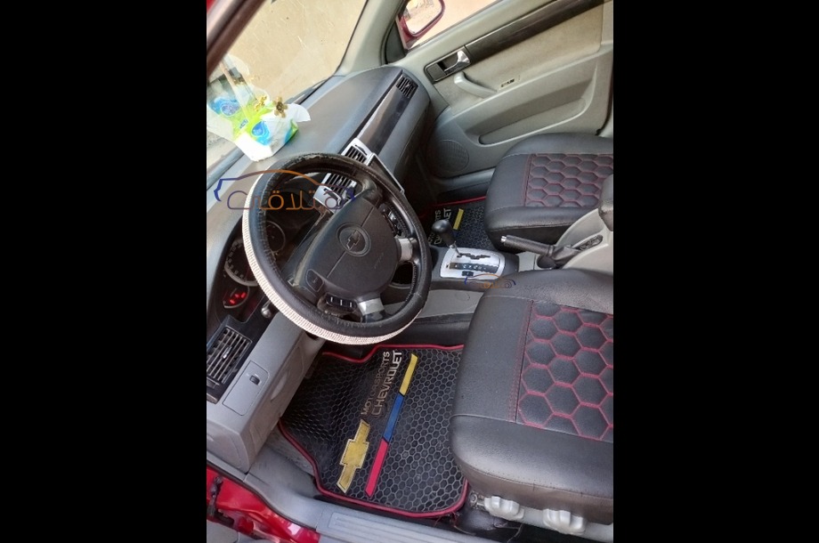 Optra Chevrolet Dark red