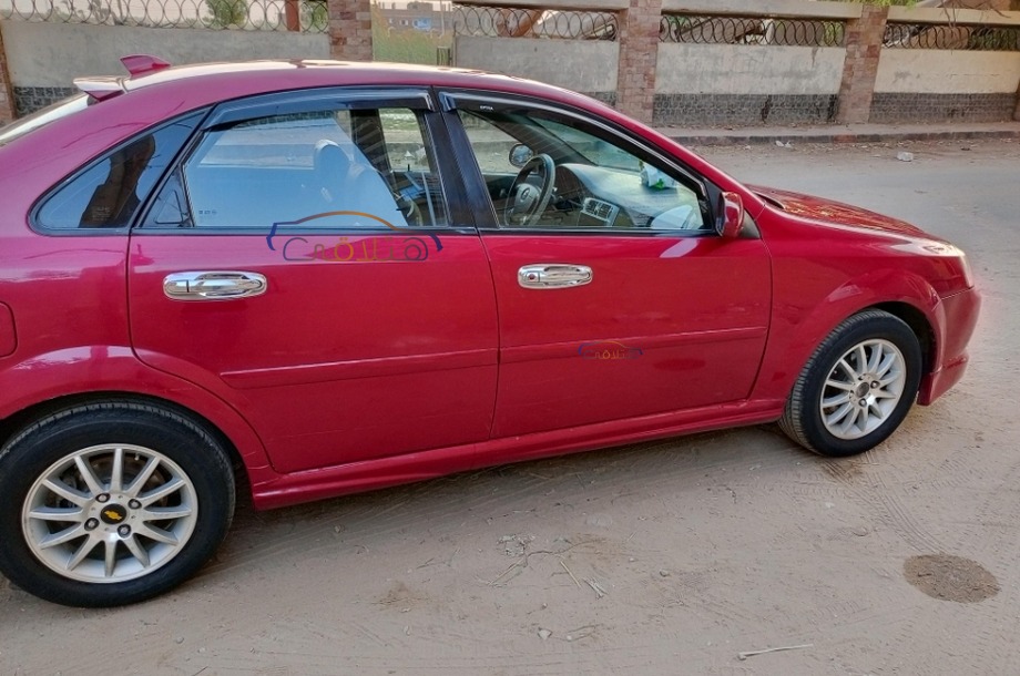Optra Chevrolet Dark red