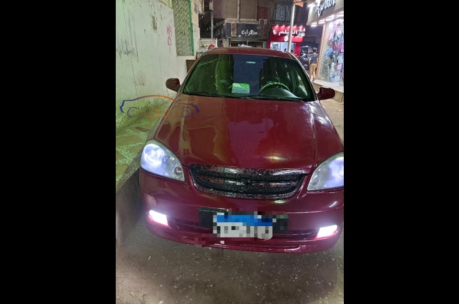 Optra Chevrolet Dark red